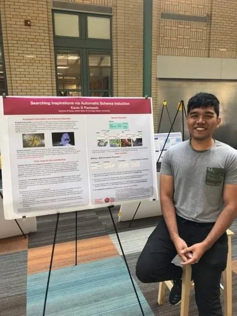 Kevin beside his research poster at Carnegie Mellon