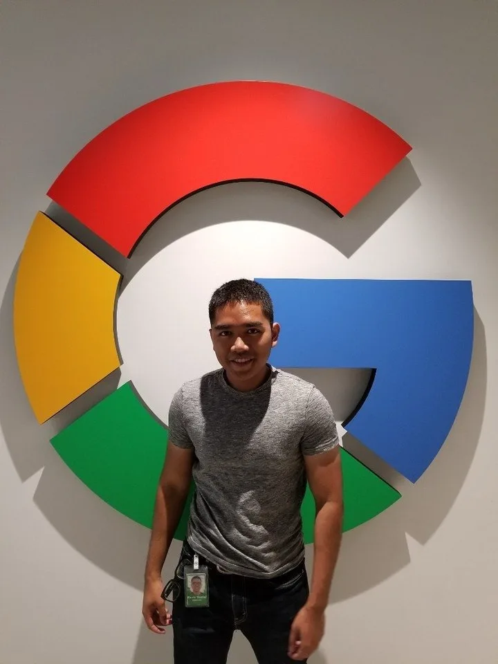 Kevin in front of the Google logo